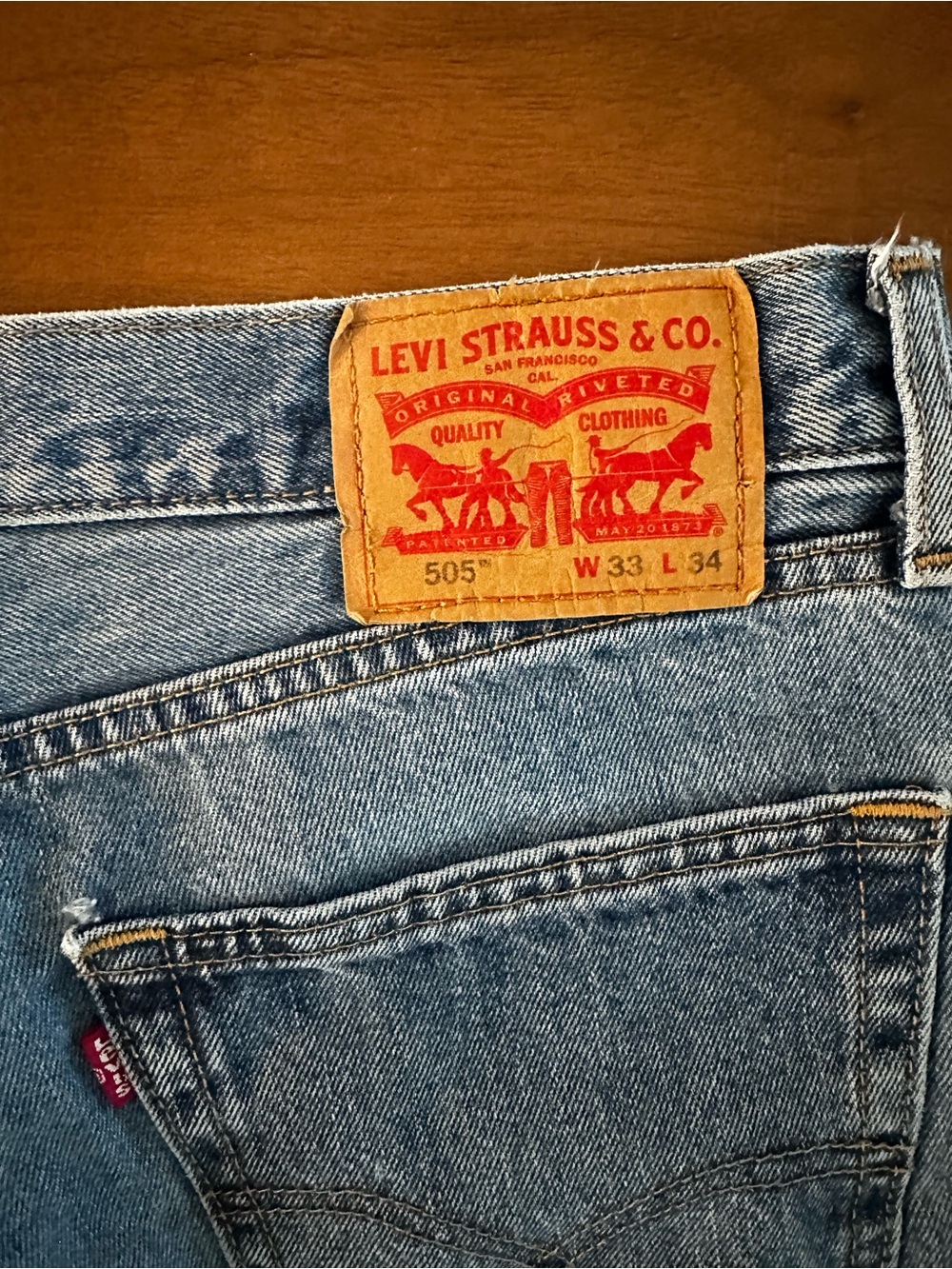 Levi's Light Blue Denim Jeans with Red Logo Patch